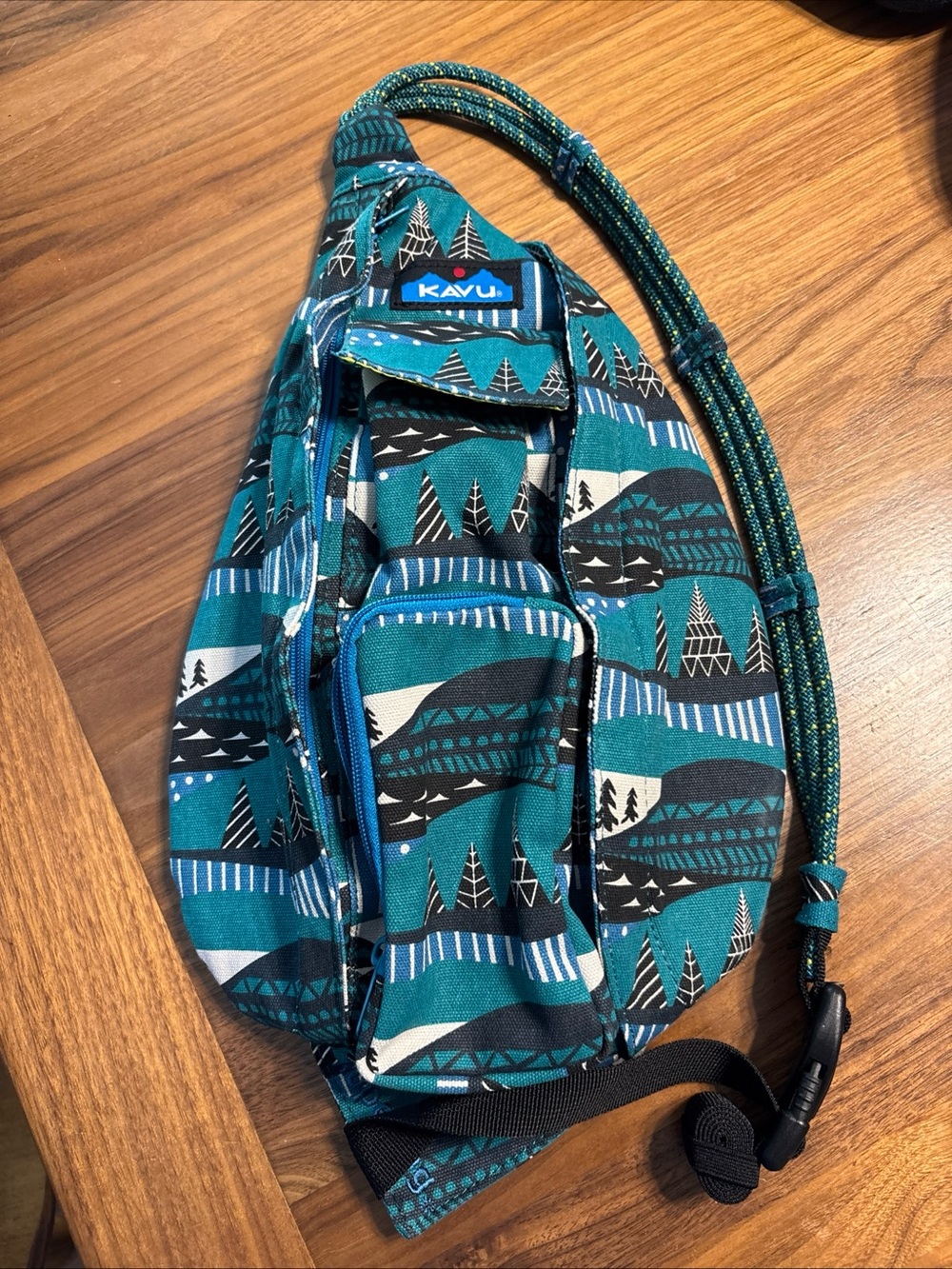 Kavu Teal Patterned Rope Sling Bag with Black & White Accents